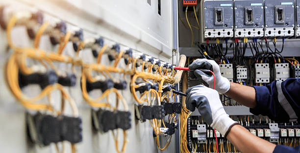 Professional Electrician technician working in Holley, FL